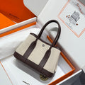 HERMES GARDEN PARTY 23CM IN BEIGE TOILETS COTTON CANVAS AND DARK BROWN CALFSKIN