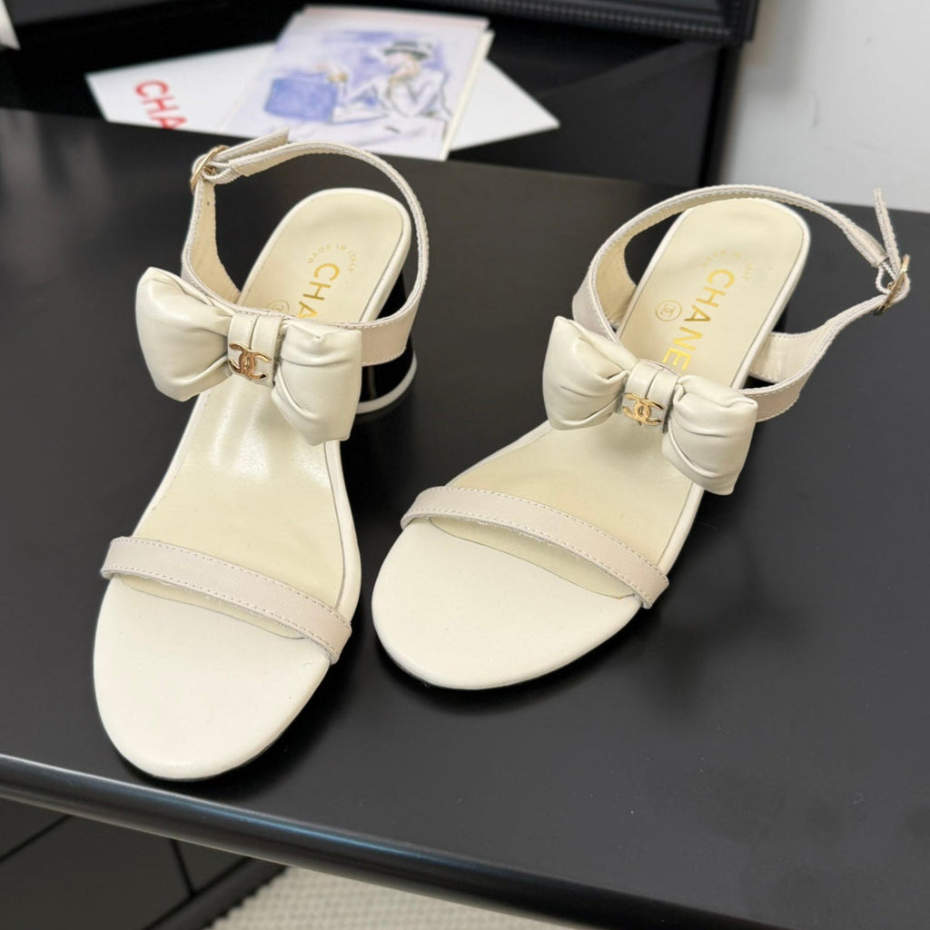 CHANEL MID HEEL SANDALS IN WHITE CALFSKIN WITH BOW